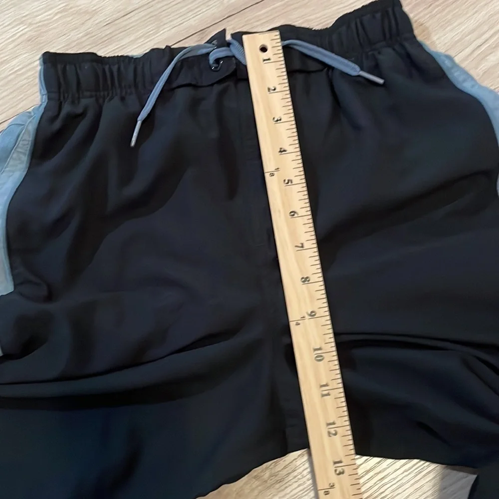 Nike men’s black/gray swim trunks. Size S.